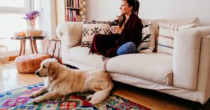 woman enjoying clean air with pet dog